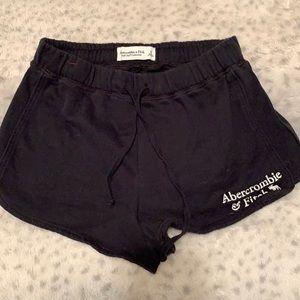 Black Abercrombie and Fitch shorts.